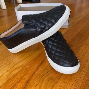 BRAND NEW black slip ons